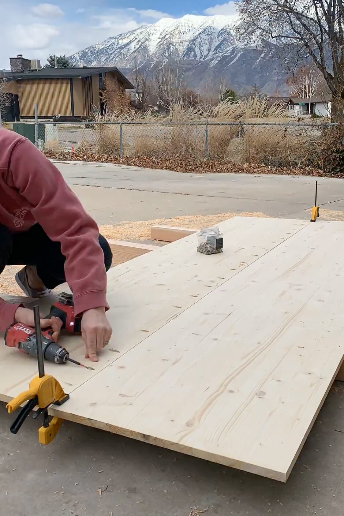 Screwing the table top together using pocket holes.